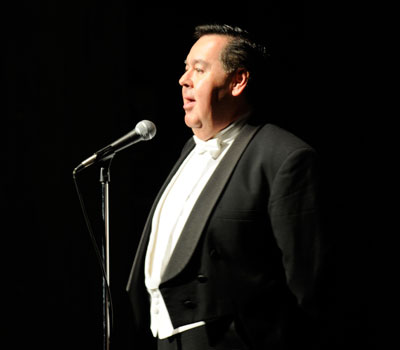 Hector Salazar at microphone